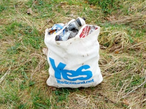 Discarded beer cans collected in a Yes Scotland bag